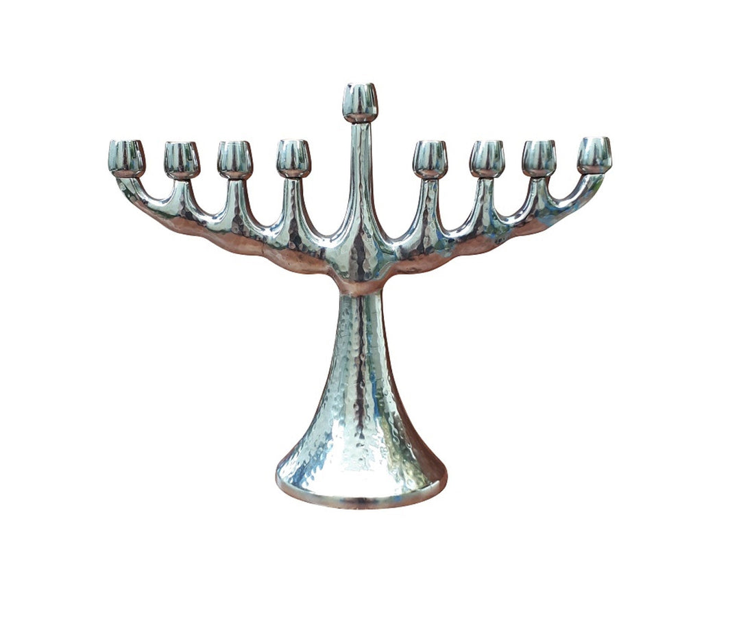 Silver-tone hammered Hanukkah menorah with eight candle cups and a raised central shamash
